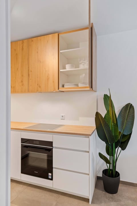 Modern meets natural in our kitchen, where functionality is served with style.