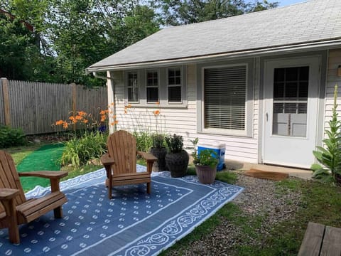 Guest House entrance and comfy Adirondack chairs for your enjoyment