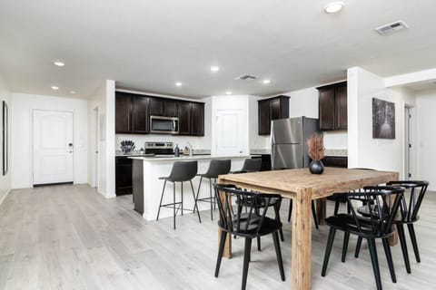 Enjoy your meals at the six-seat dining room table.