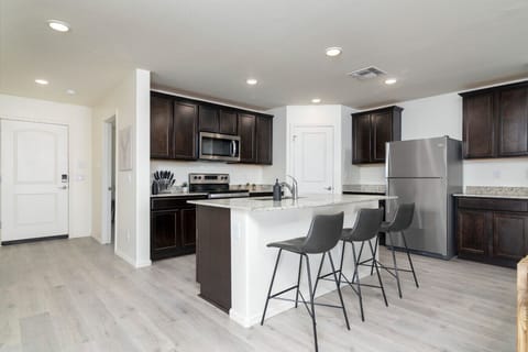 Gorgeous kitchen with a large island to provide space for wonderful meals.