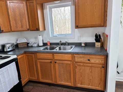 Pots, Pans, Crock pot, Blender, Utensils (both metal & paper)