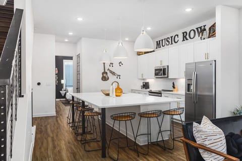 Massive kitchen island with seating for 8. We provide all the kitchen essentials, cleaning supplies, and utensils so you can cook & make yourself at home.