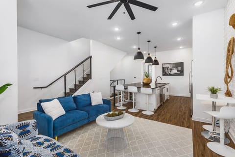 Spacious kitchen & living areas with a Smart TV, comfortable furnishings, and plenty of seating for your group to kick back after exploring the city.