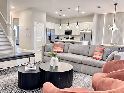 The living room, dining area and kitchen are open concept and fully integrated.