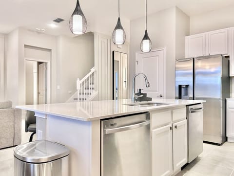 All details of the kitchen island in stainless steel.