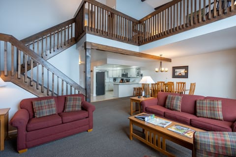 Wrap around staircase to upper level