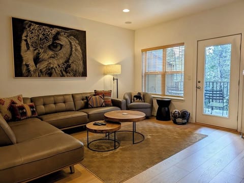 Relax on the oversize sofa while enjoying views of the Mt Hood National Forest