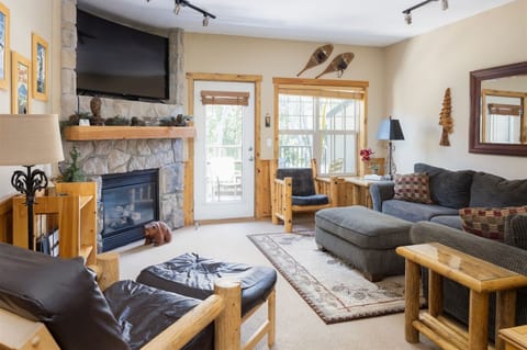 Living Room with a Gas Fireplace and TV