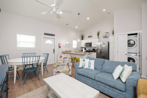 Relax in your bright, open living space where kitchen, dining, and lounge flow seamlessly together for easy coastal living.