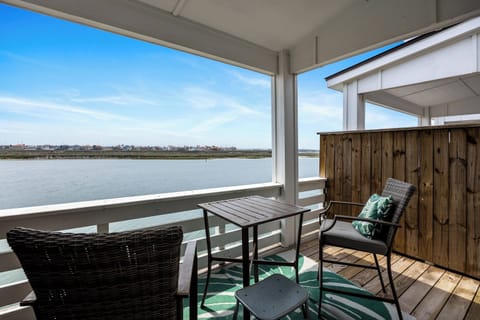 Sip your morning coffee on your private waterfront balcony, watching boats drift by while enjoying endless water views.