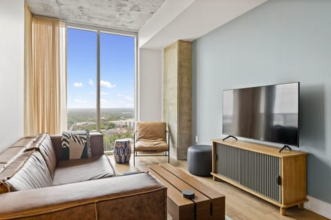Luxury Condo, 1 King Bed with Sofa bed, Balcony, City View | Living area | LED TV, Netflix, books, streaming services