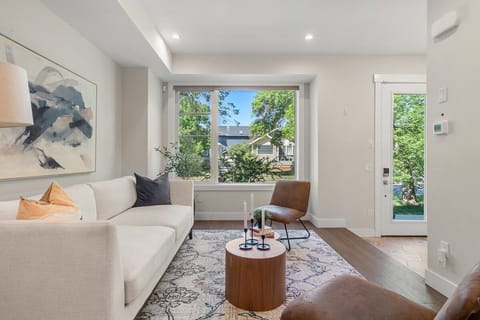Guests will be invited to enjoy 
- Four level home 
- Four bedrooms 
- Four and a half bathrooms 
- Three separate living spaces 