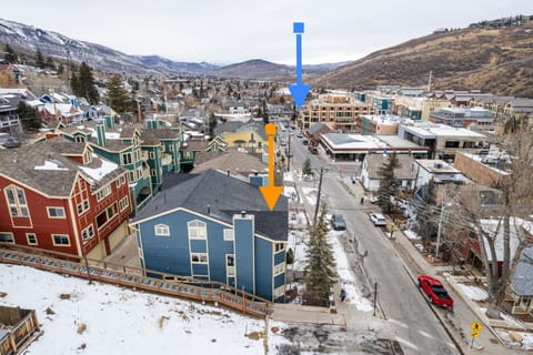 Aerial view showing the charming blue home just steps from lively downtown Park City.