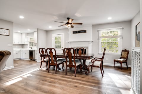 large dining area in open floorplan (fireplace is inoperable)


