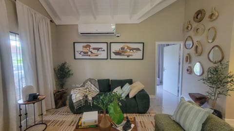 Elegant lounge with smart TV & chic decor- perfect after exploring attractions