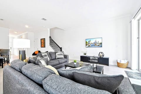 Welcome to our lovely 5 bedroom townhome with private pool at the new phase of Storey Lake. You have the entire house for you and your party, and free access to both clubhouses! One is almost across the street.