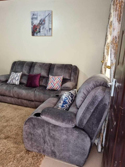 Family House | Living area | 24-inch Smart TV with digital channels