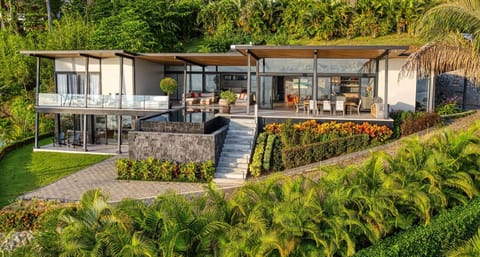 A stunning aerial perspective showcasing the villa’s striking architecture