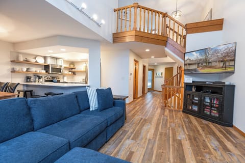 Relax with the entire family or group of friends in this large open-concept townhouse