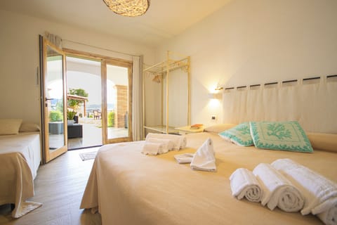 Deluxe Triple Room, Garden View | Frette Italian sheets, premium bedding, Select Comfort beds, minibar