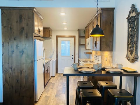 Everything needed in kitchen and laundry for a comfortable vacation getaway.