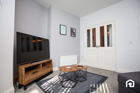 Whether you're gathering with family or simply enjoying a quiet moment alone, this living area is the perfect place to unwind and make lasting memories.