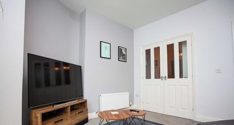 Whether you're gathering with family or simply enjoying a quiet moment alone, this living area is the perfect place to unwind and make lasting memories.