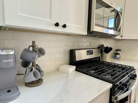 A well-equipped kitchen includes coffee makers, of course