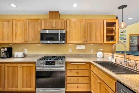 The kitchen has ample counter space and up to date appliances.
