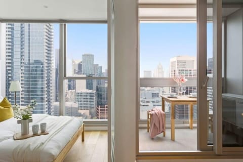 A balcony with city views and an outdoor setting.