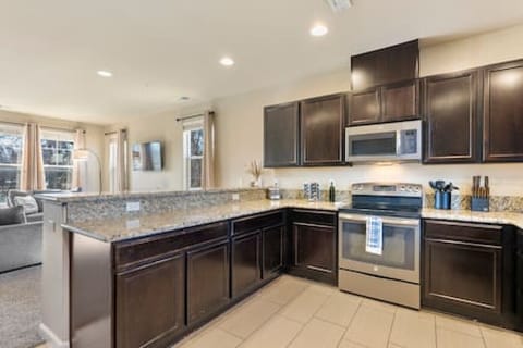 Chef up some amazing meals in our modern, open concept kitchen with all of your cooking essentials included.