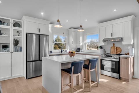 Large, modern and open concept kitchen, fully stocked with everything needed for cooking