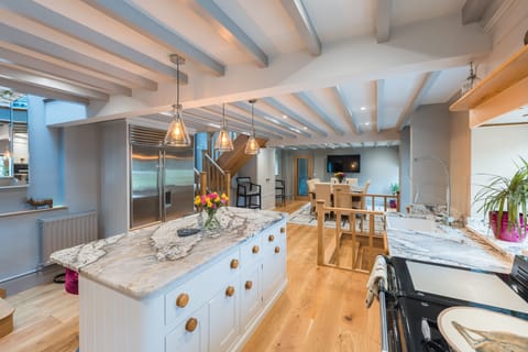 kitchen island with view of dining area