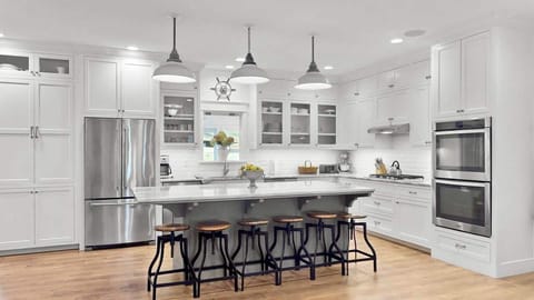 Expansive kitchen island with seating for 6, kitchen table can sit 12