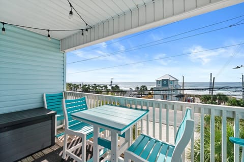 Spacious balcony with seating for 6 and great views of the beach and sunset.