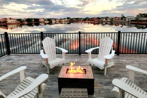 Enjoy an evening by the fire table overlooking the lake on your private deck.