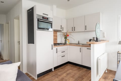 The kitchen of holiday park Klein Vink Boulevard 27 - EEZZ