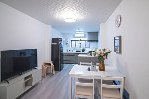 Deluxe Villa | Living area | Flat-screen TV