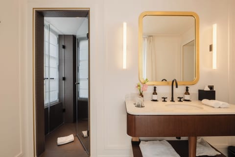Deluxe Room | Bathroom | Designer toiletries, hair dryer, bathrobes, slippers