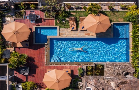 Outdoor pool, pool umbrellas, sun loungers