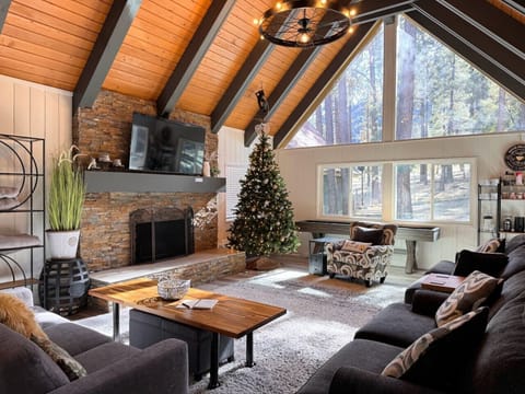 Welcome to Knotty by Nature: Where rustic charm meets modern comfort in your perfect mountain retreat.