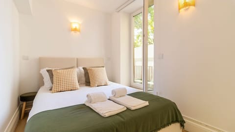 Wake up refreshed in this tranquil bedroom, bathed in soft natural light, and step out onto the balcony for a moment of peace. This comfortable sanctuary offers all you need for a restorative stay, blending style with restful ease.