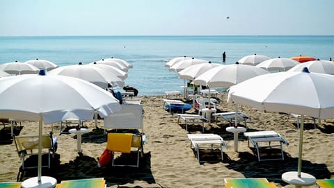 Private beach, white sand, beach shuttle, sun loungers