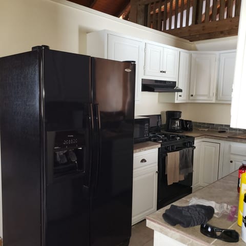 Kitchen full with fridge, microwave, stove, oven, and dish washer