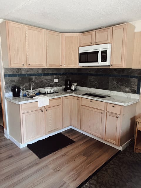 Signature Double Room | Private kitchen | Fridge, microwave, coffee/tea maker, freezer