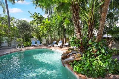 Outdoor pool, open 8:00 AM to 7:00 PM, pool umbrellas, sun loungers