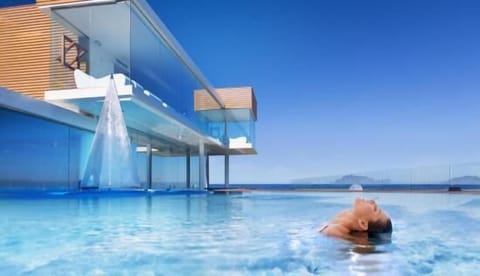 Outdoor pool, pool umbrellas, sun loungers