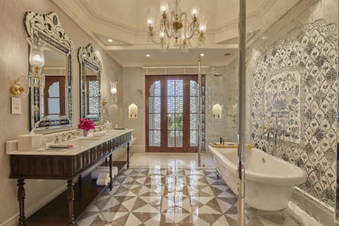 Separate tub and shower, rainfall showerhead, free toiletries