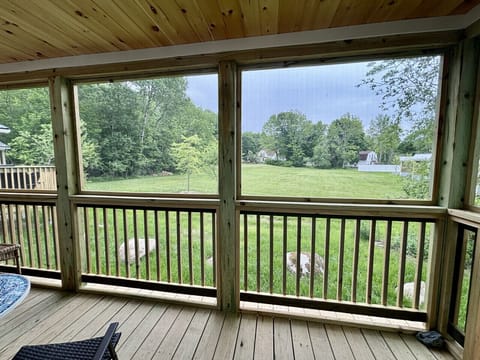 Screened in Porch viewing the field