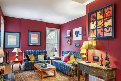 Living room with smart TV, design details and a warm, collected feel